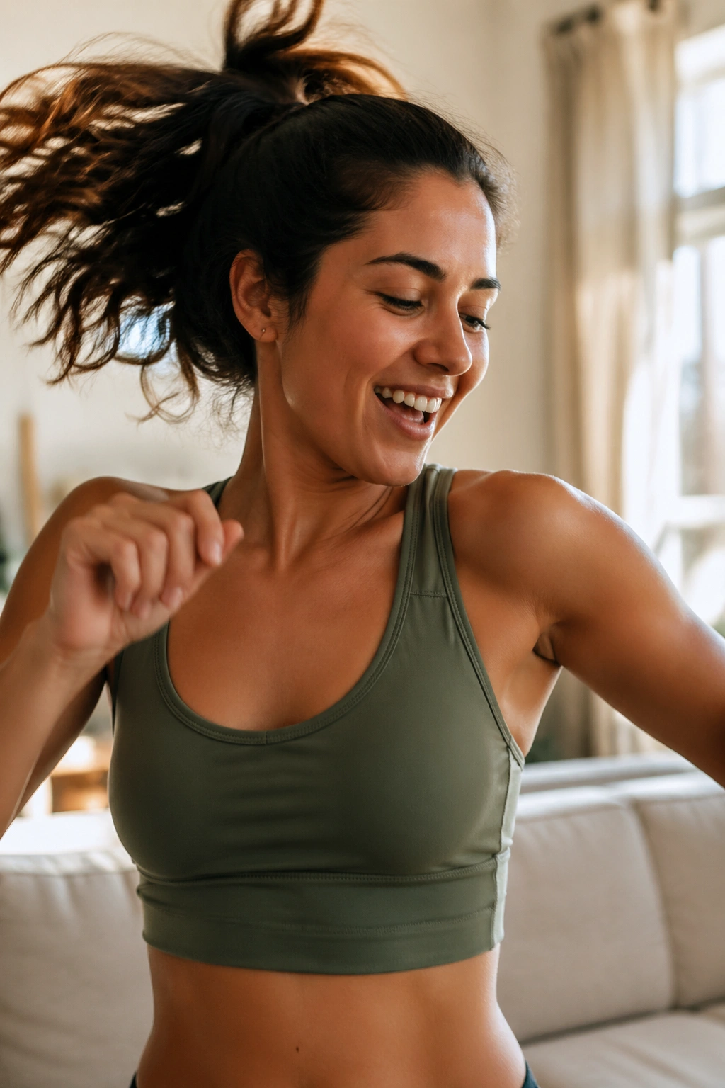 Woman dancing in a cozy home to three songs