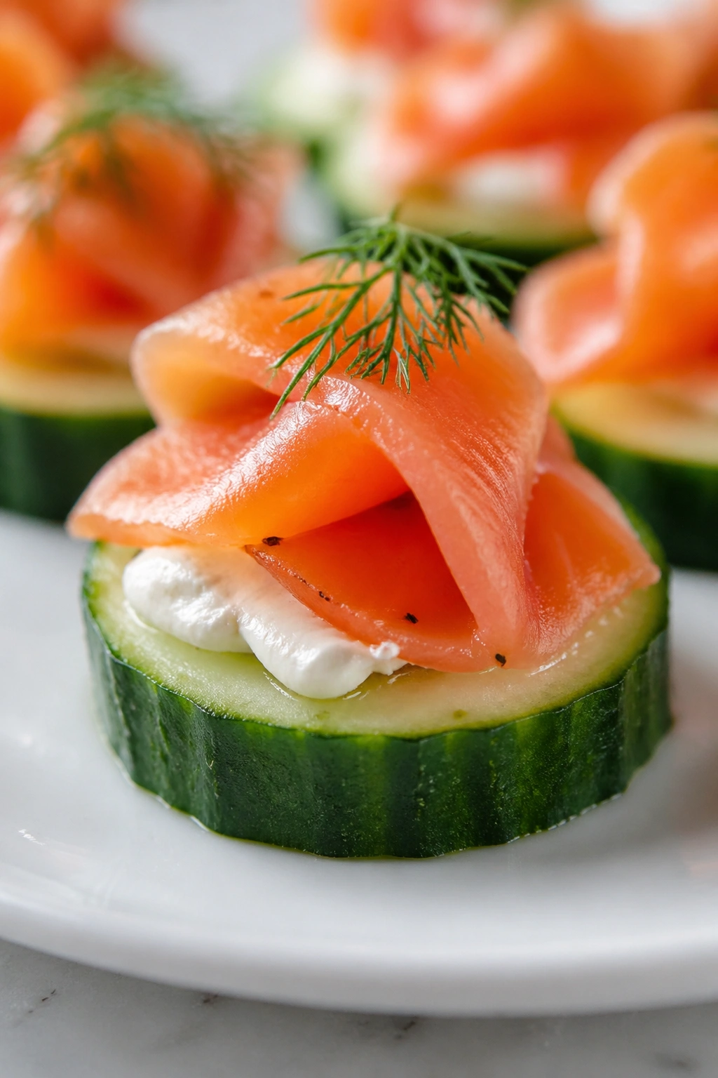 Cucumber round topped with smoked salmon and cream cheese