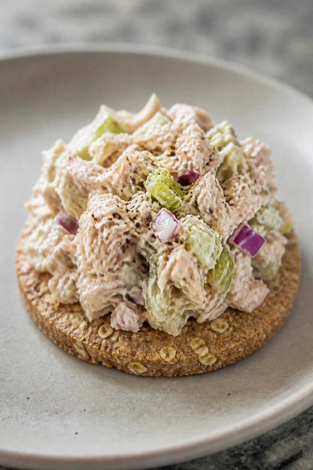 Close-up of tuna salad on a cracker