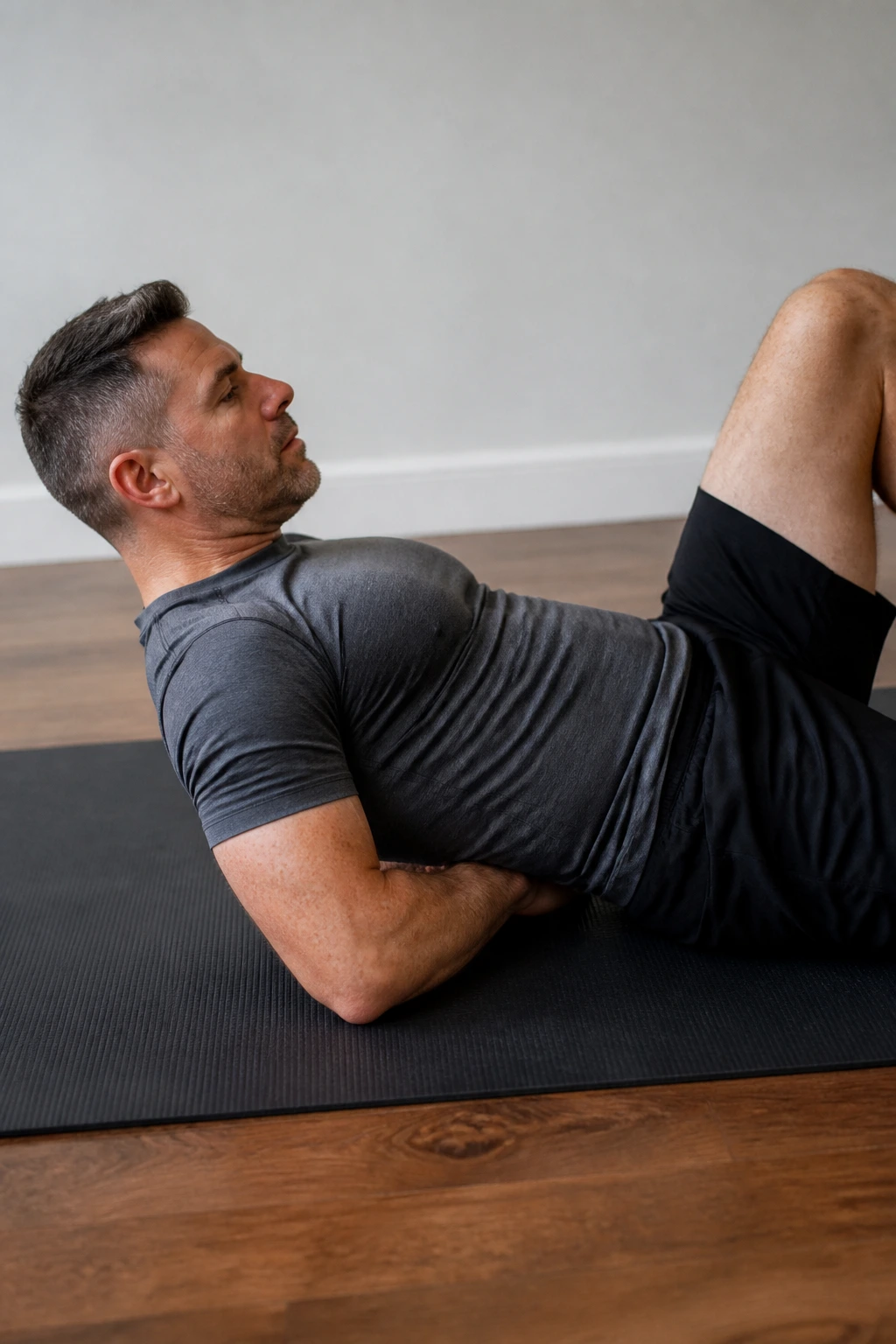 McGill curl-up performed with small lift of head and shoulders