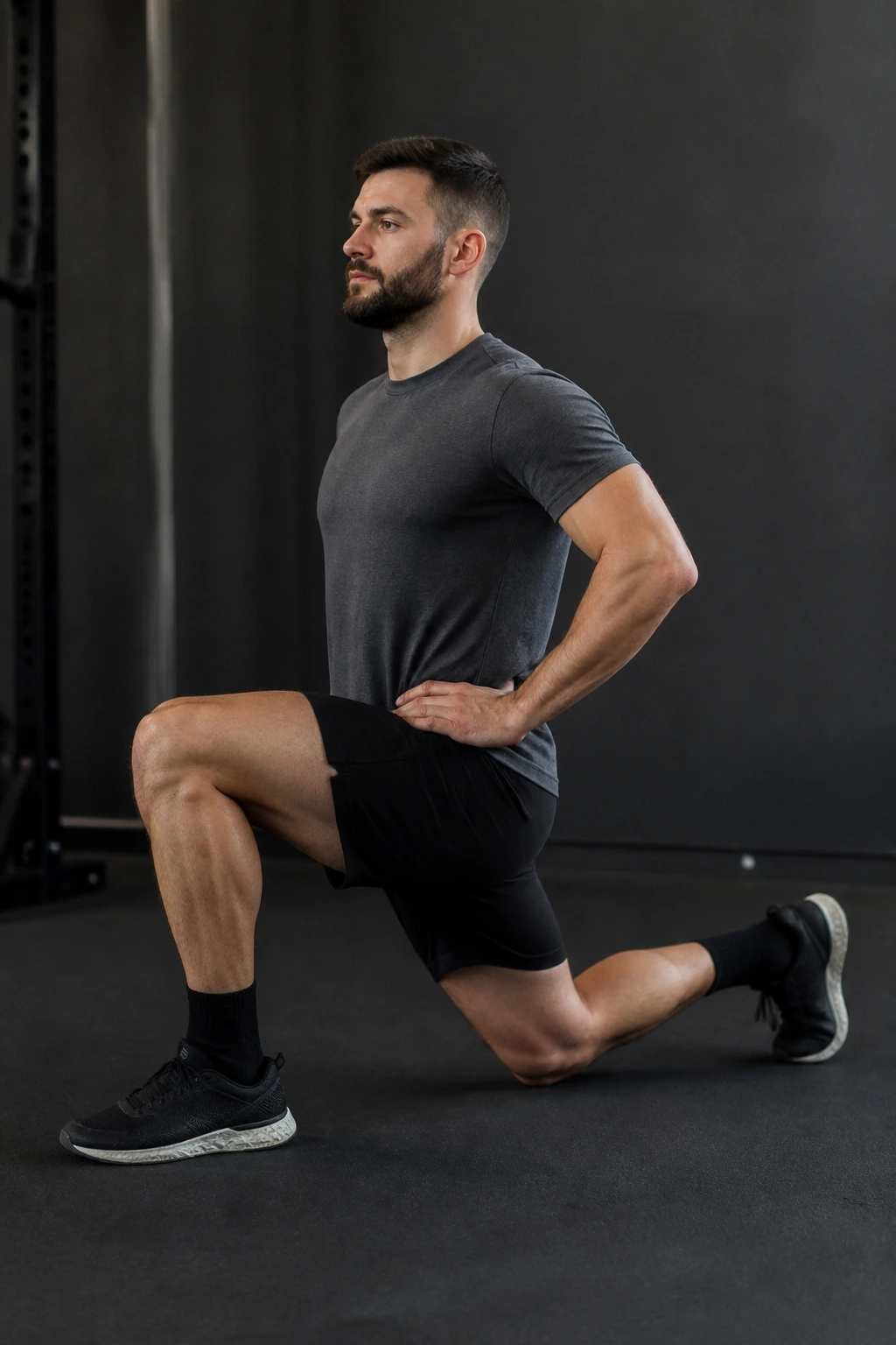 Close-up of a person in a static split squat maintaining upright posture